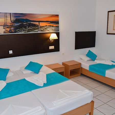 Blue Nest Hotel Тигаки Экстерьер фото