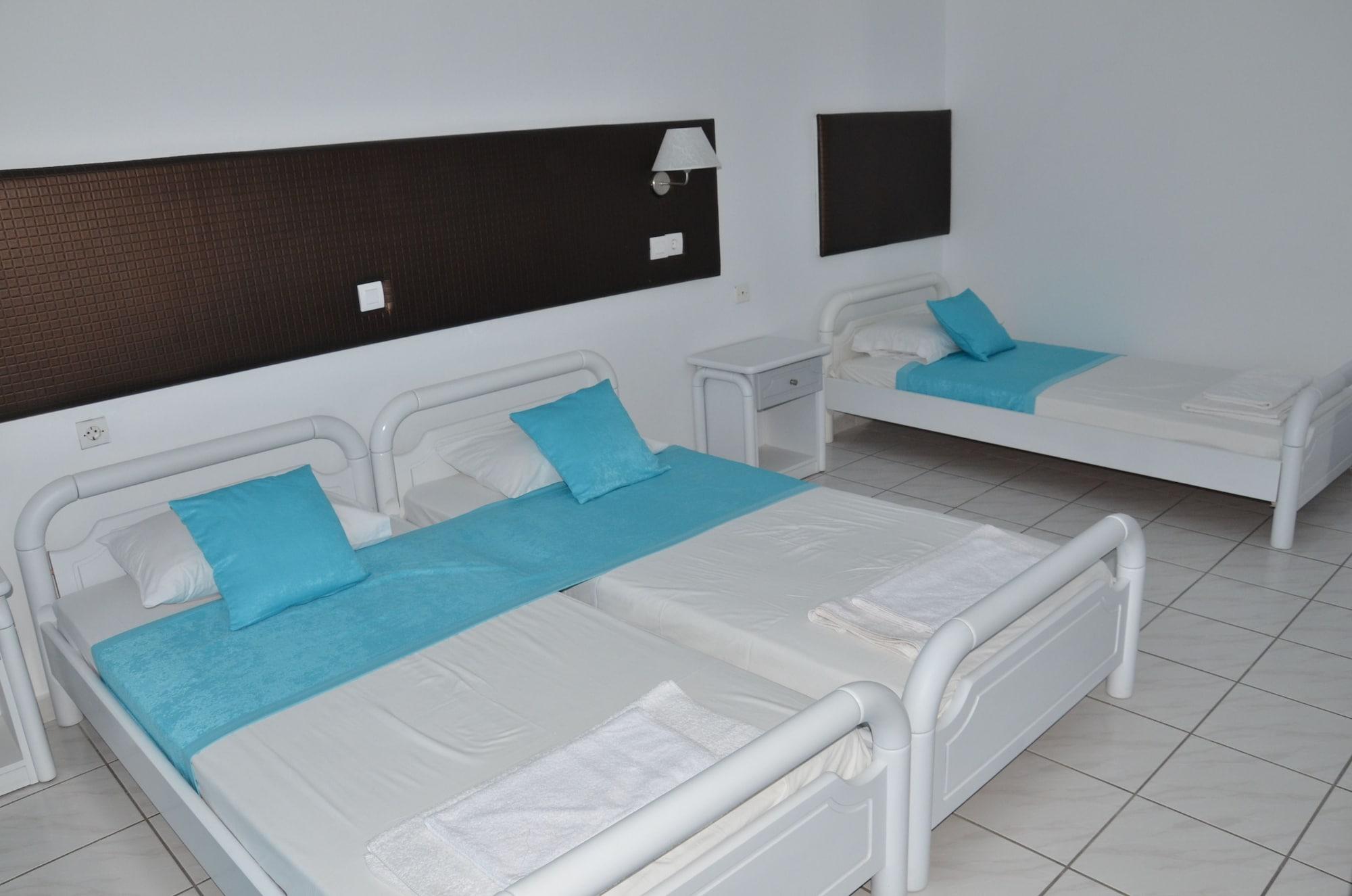 Blue Nest Hotel Тигаки Экстерьер фото