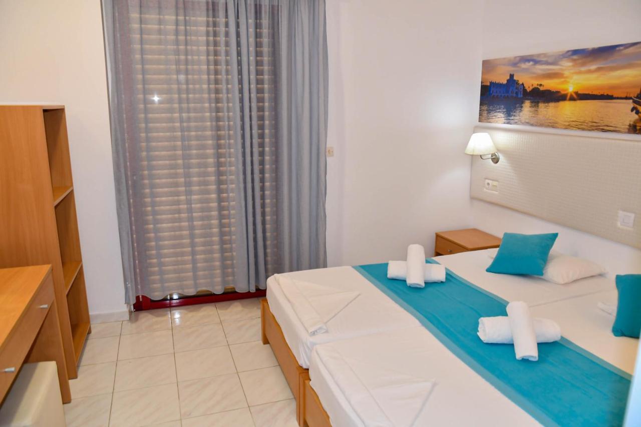 Blue Nest Hotel Тигаки Экстерьер фото