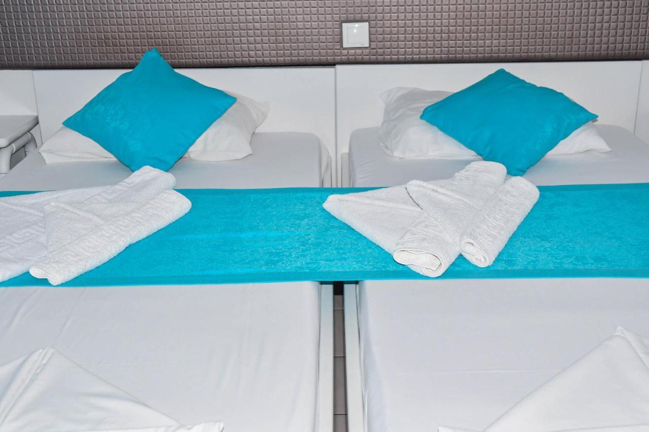 Blue Nest Hotel Тигаки Экстерьер фото