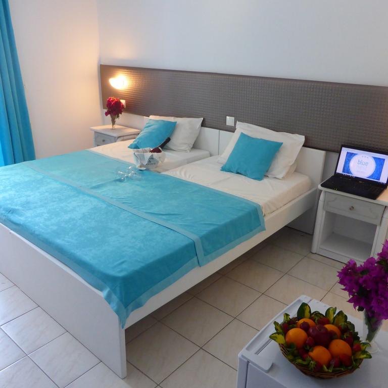 Blue Nest Hotel Тигаки Экстерьер фото